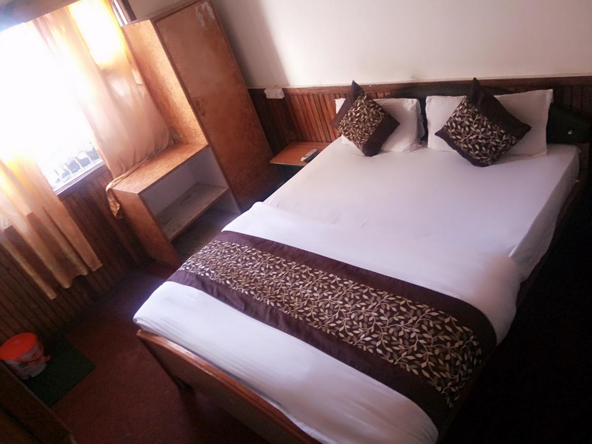 Goroomgo Luxury Stay Mall Road Nainital Esterno foto
